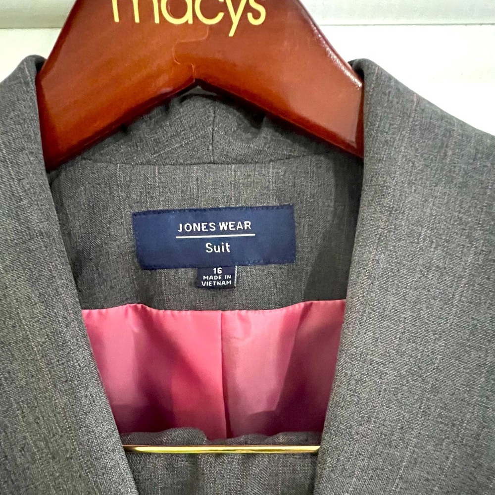 Never worn two piece Jones Wear Grey pants suit with pink liner